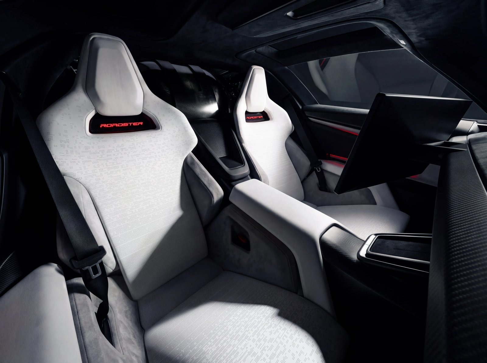 Khoang lái hai chỗ của Tesla Roadster thế hệ hai với ghế trắng và màn hình trung tâm